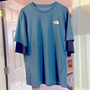 Men’s Large North Face sports shirt in teal with black flash dry sleeve inserts